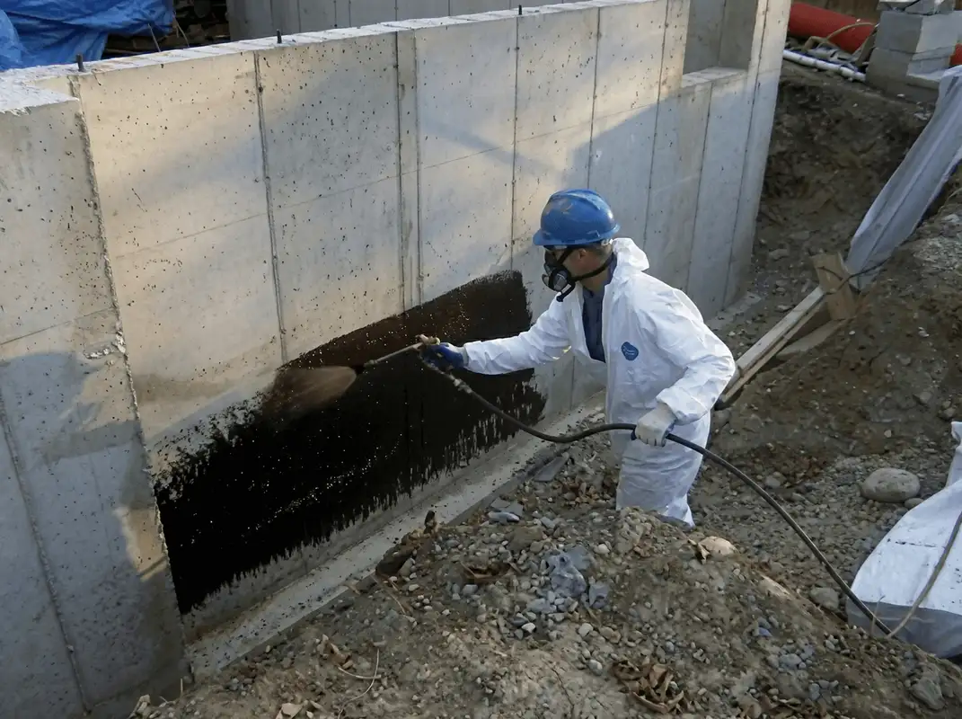Professional waterproofing the exterior walls of the basement in Louisville, KY