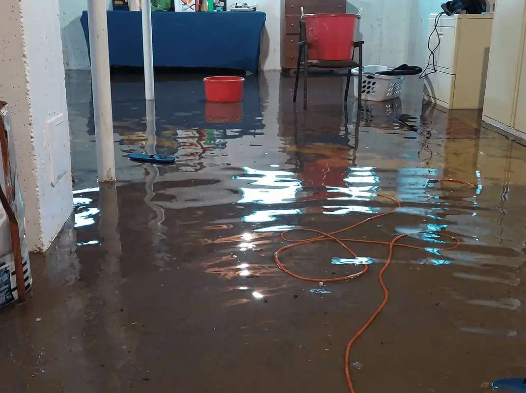 Basement with boiler, cabinets and washing machine completely flooded in Louisville, KY
